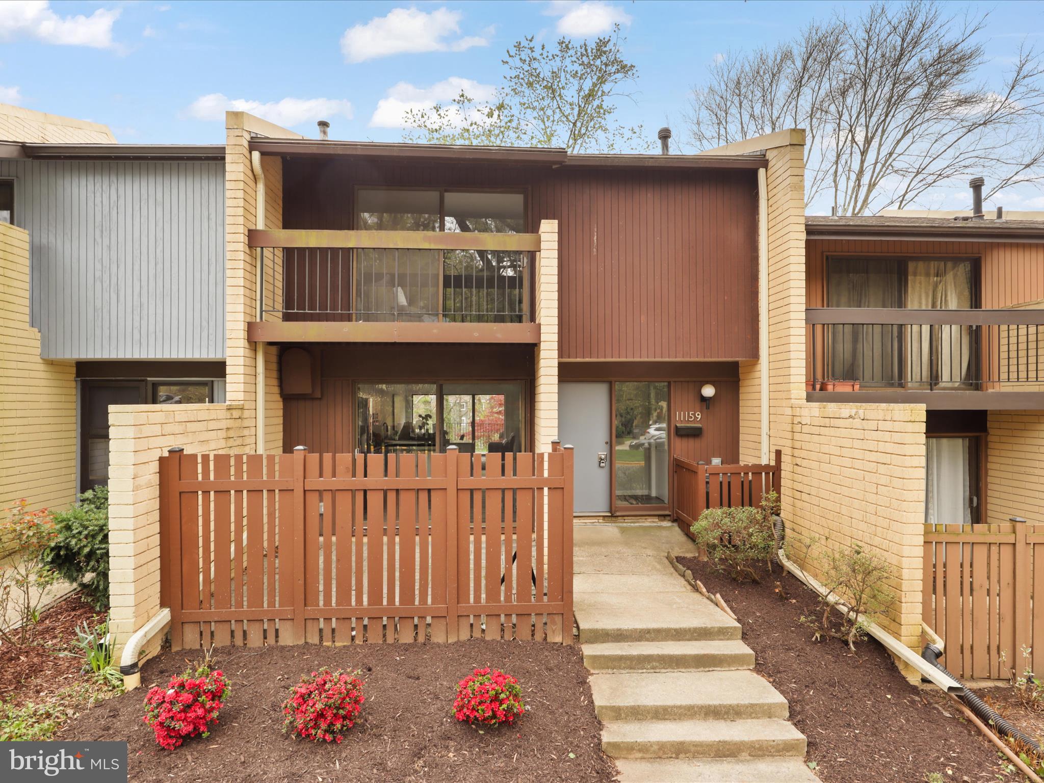 a front view of a house with a porch