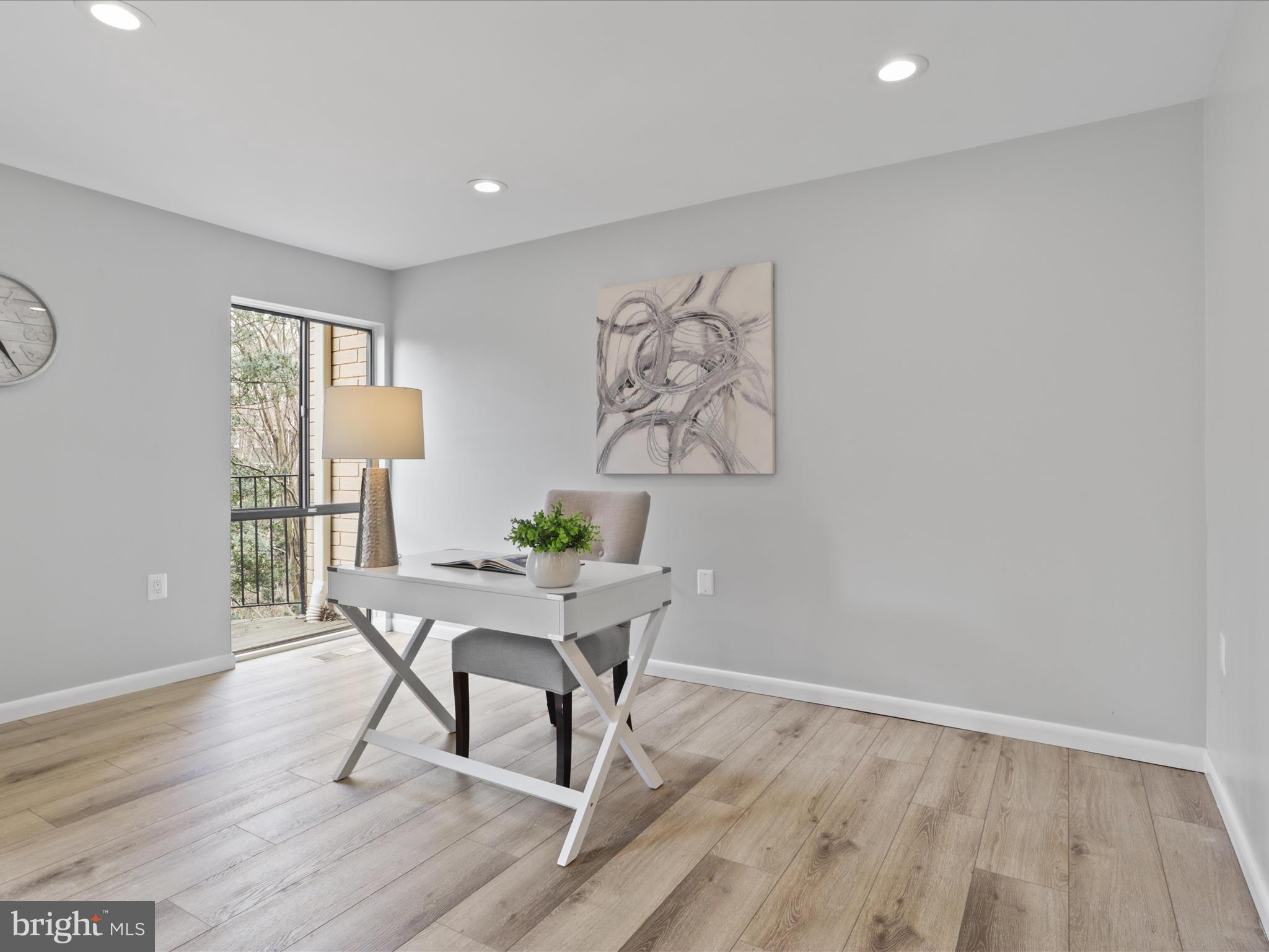 11159 Saffold Way Reston, VA 20190 - Photo 13 of 51 a workspace room with furniture and wooden floor