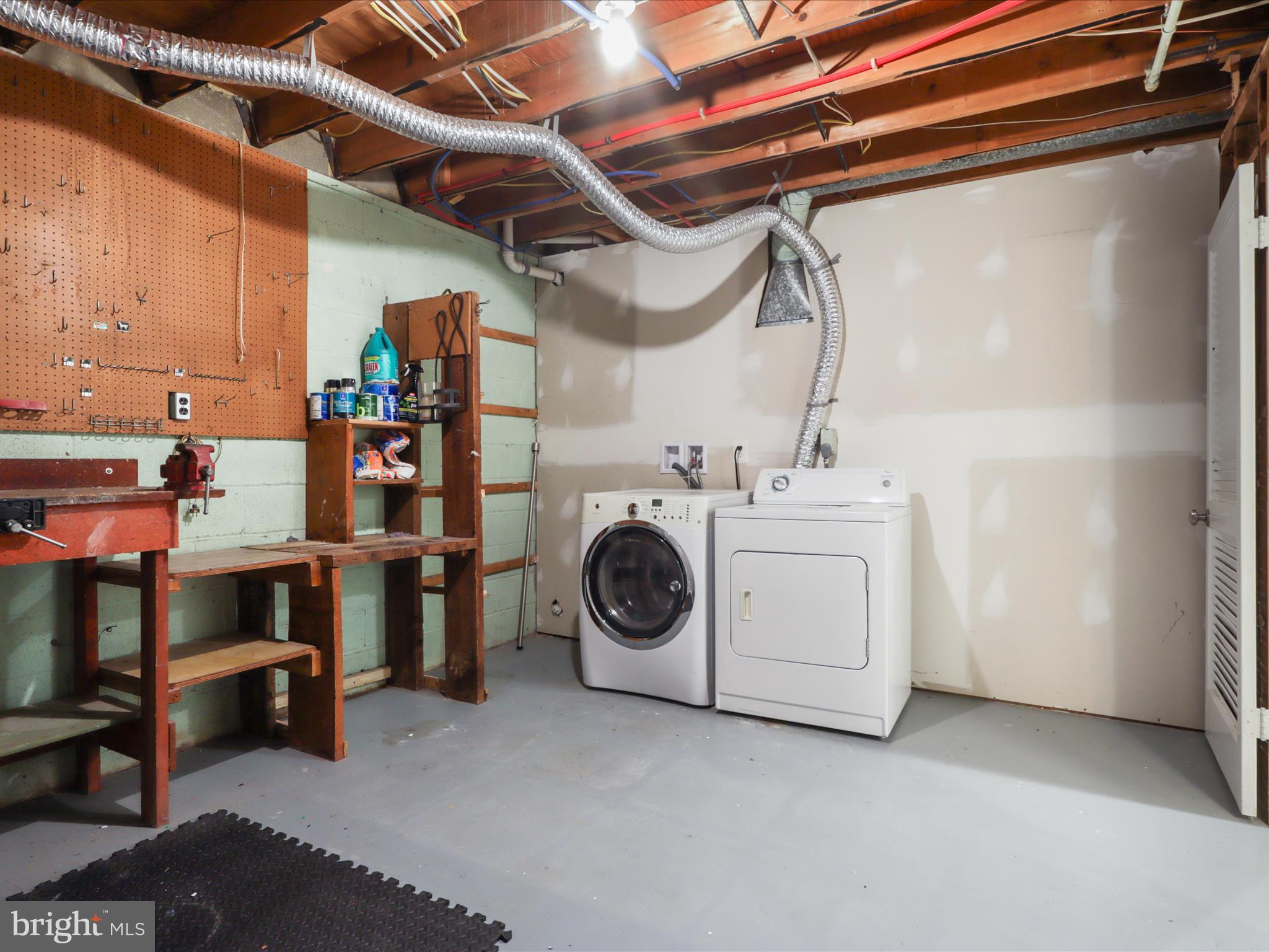 11159 Saffold Way Reston, VA 20190 - Photo 31 of 51 a utility room with dryer and washer