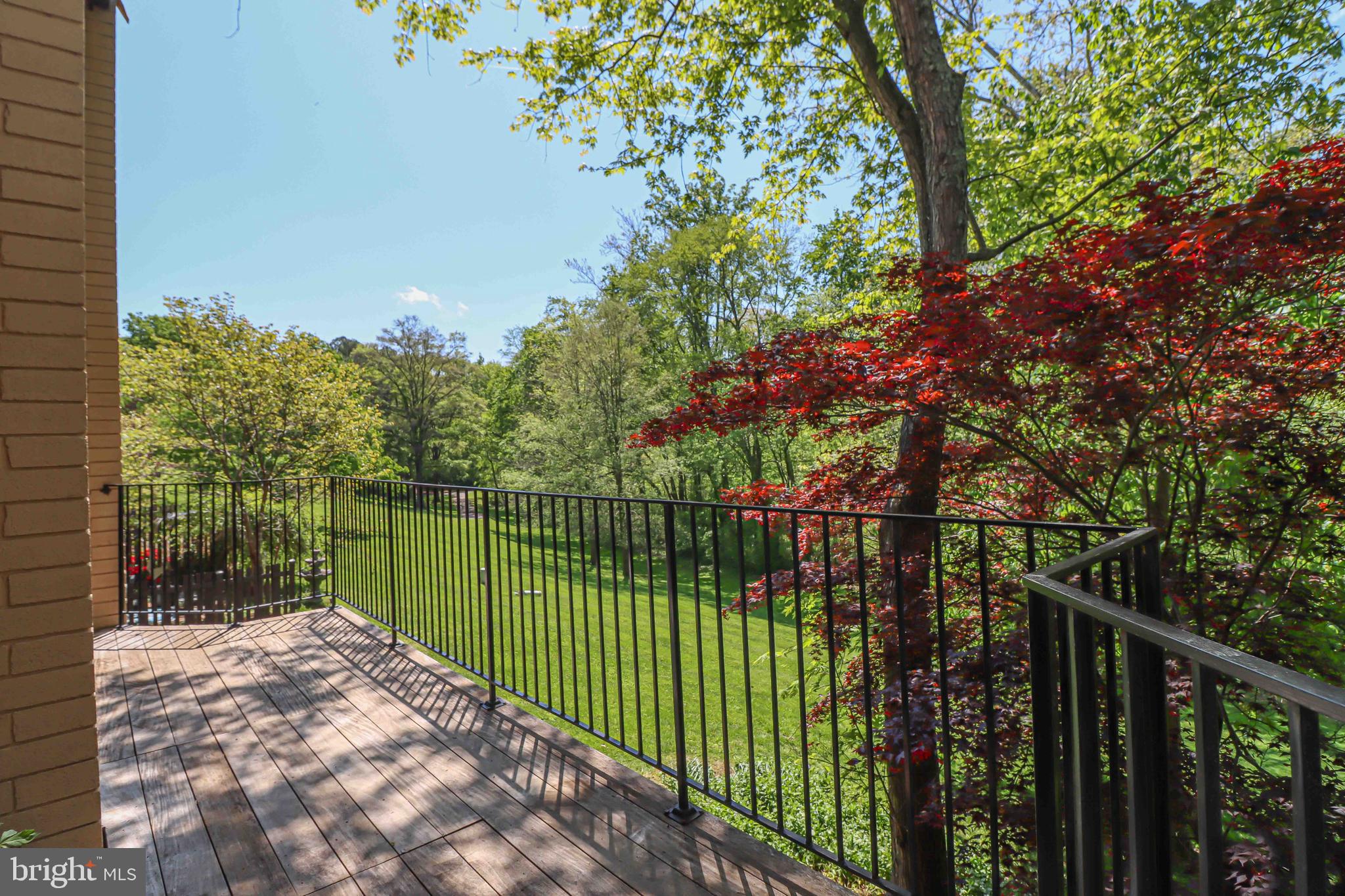 11159 Saffold Way Reston, VA 20190 - Photo 32 of 51 a balcony with trees in front of it