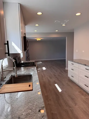 a view of a living room with furniture