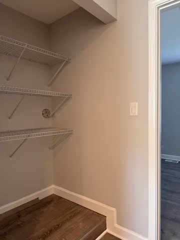 a view of a room with racks on the wall