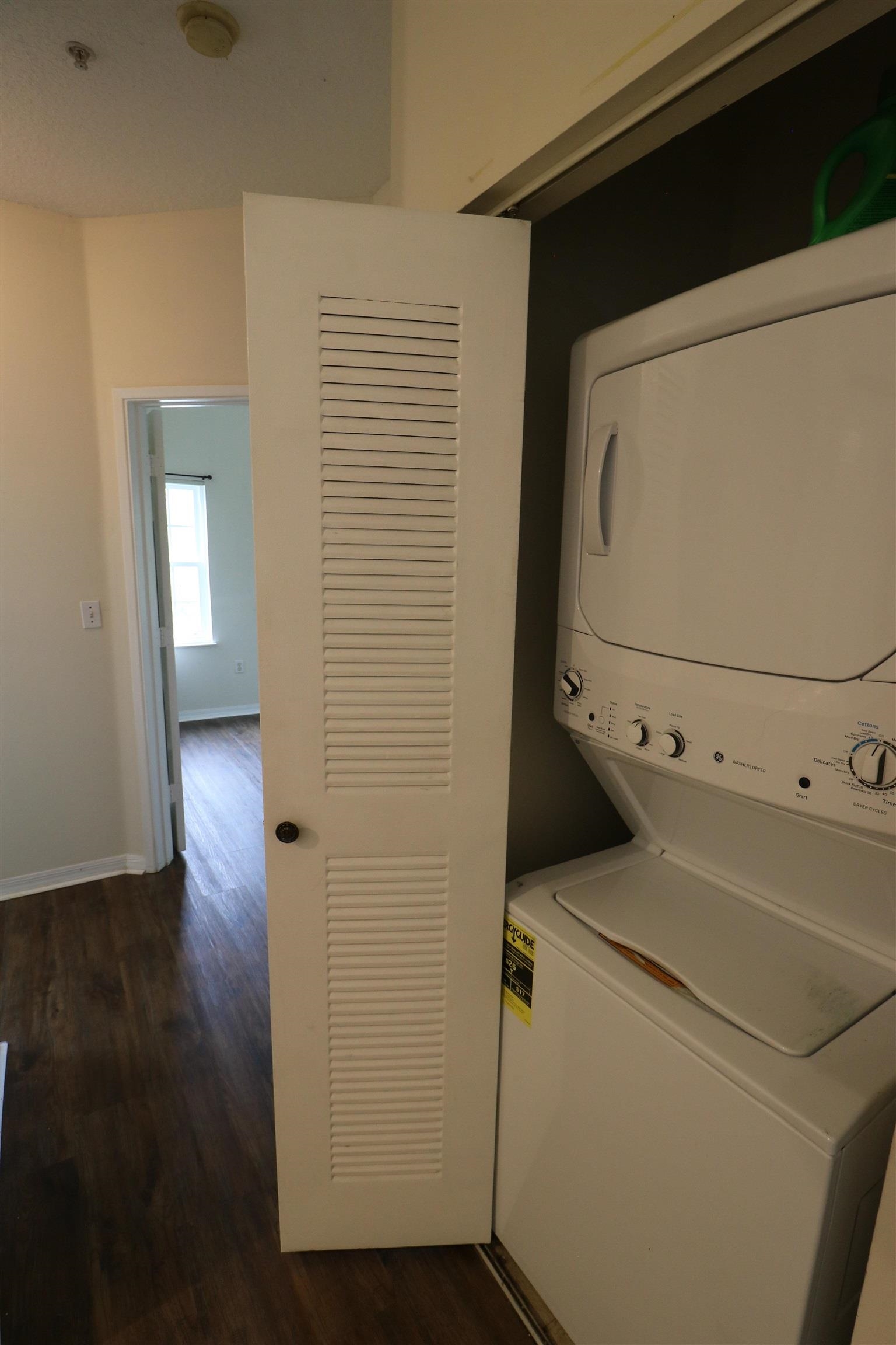 625 Fairway Drive, Unit 302 St. Augustine, FL 32084 - Photo 11 of 22 a utility room with dryer and washer