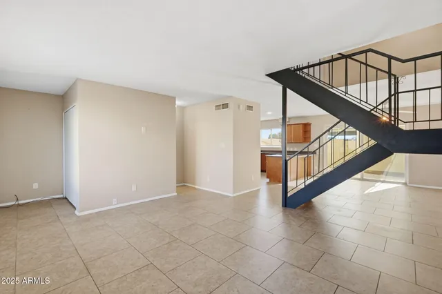 a view of staircase with white walls and white walls