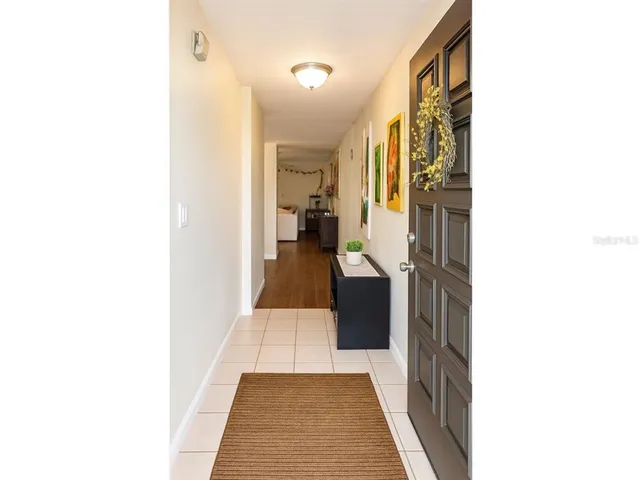 a en suite bathroom with a sink and a mirror