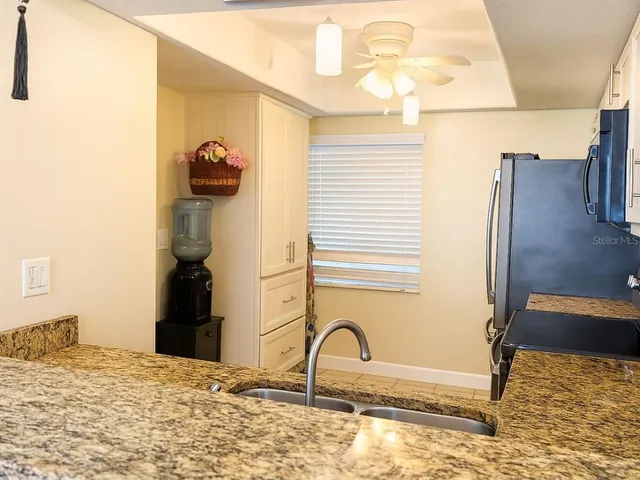 a bathroom with a sink and a window