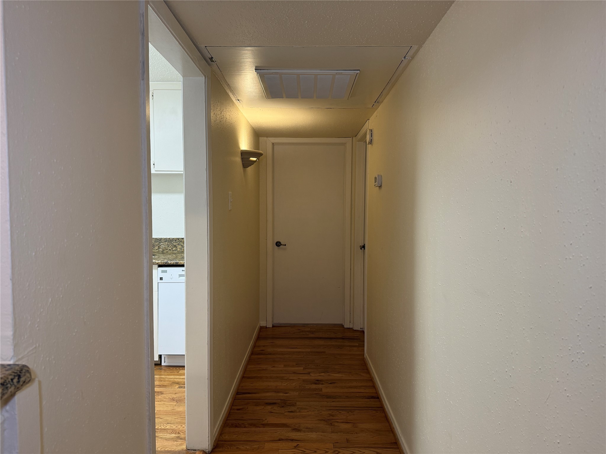 1801 Cortlandt Street, Unit 16 Houston, TX 77008 - Photo 15 of 35 a view of a hallway with wooden floor