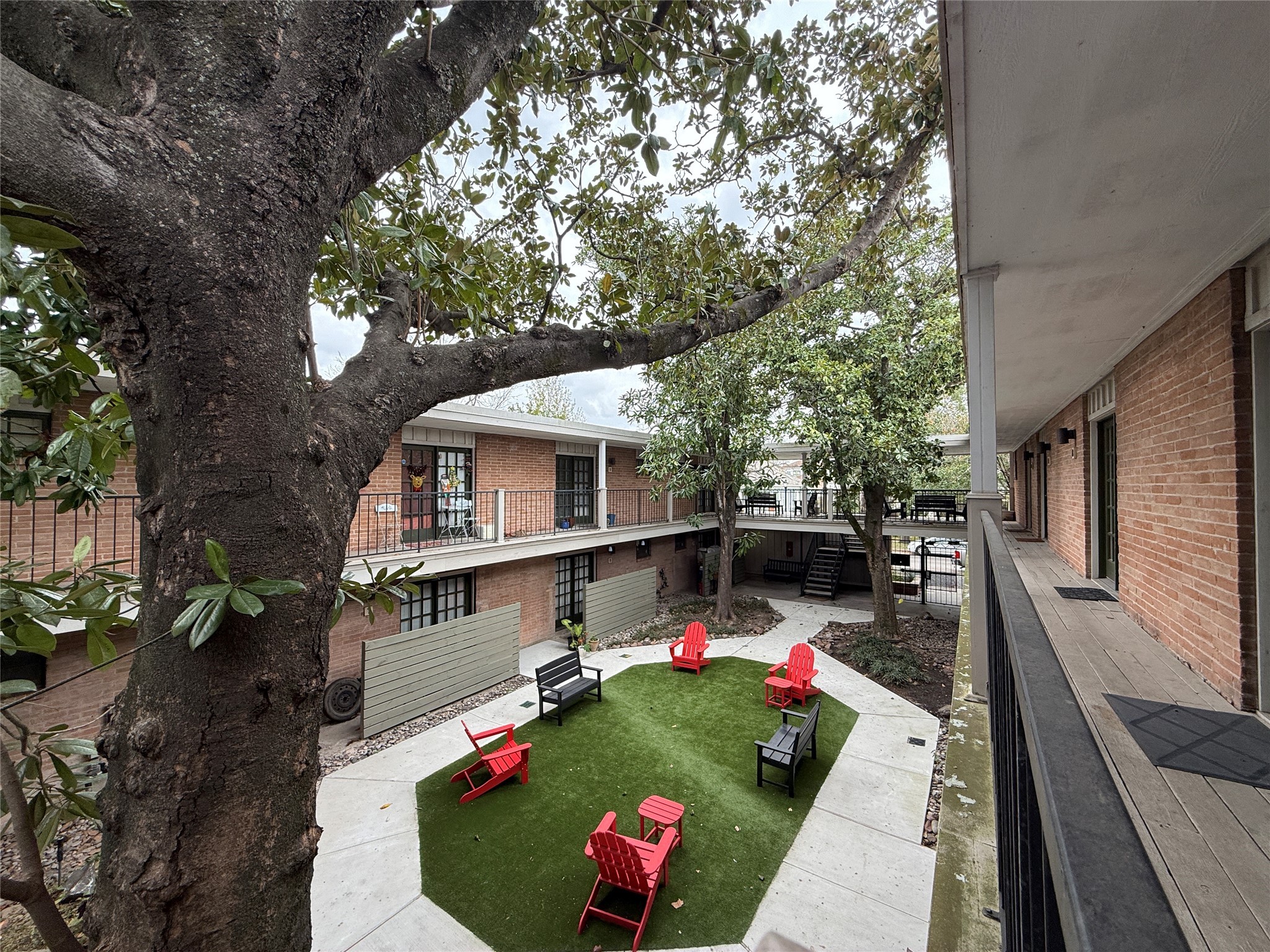 1801 Cortlandt Street, Unit 16 Houston, TX 77008 - Photo 4 of 35 a view of house with swimming pool outdoor seating