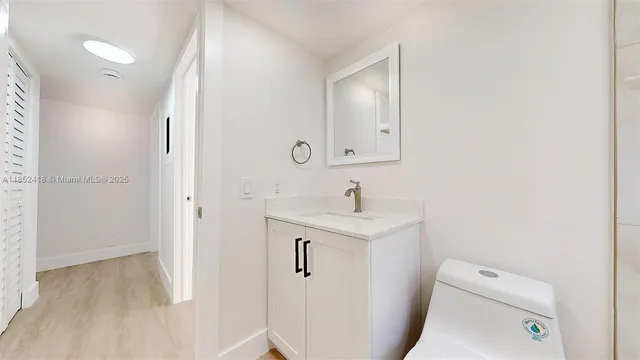 a bathroom with a sink toilet a bathtub and shower