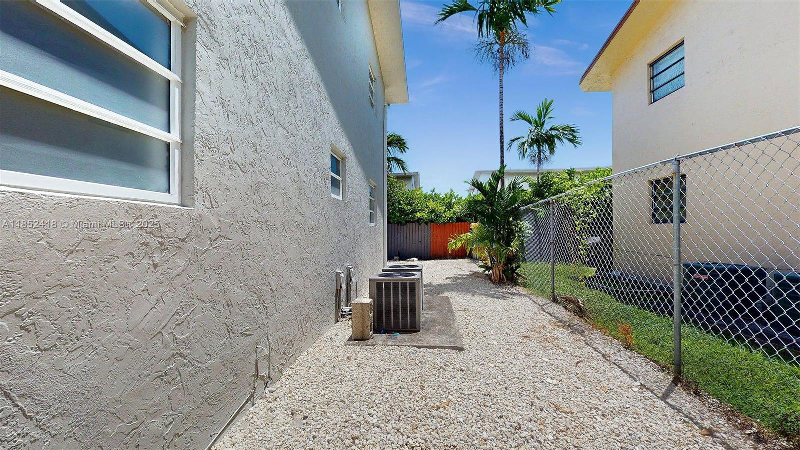1674 West 42nd Street, Unit 1674 Hialeah, FL 33012 - Photo 29 of 29 a view of a backyard with plants