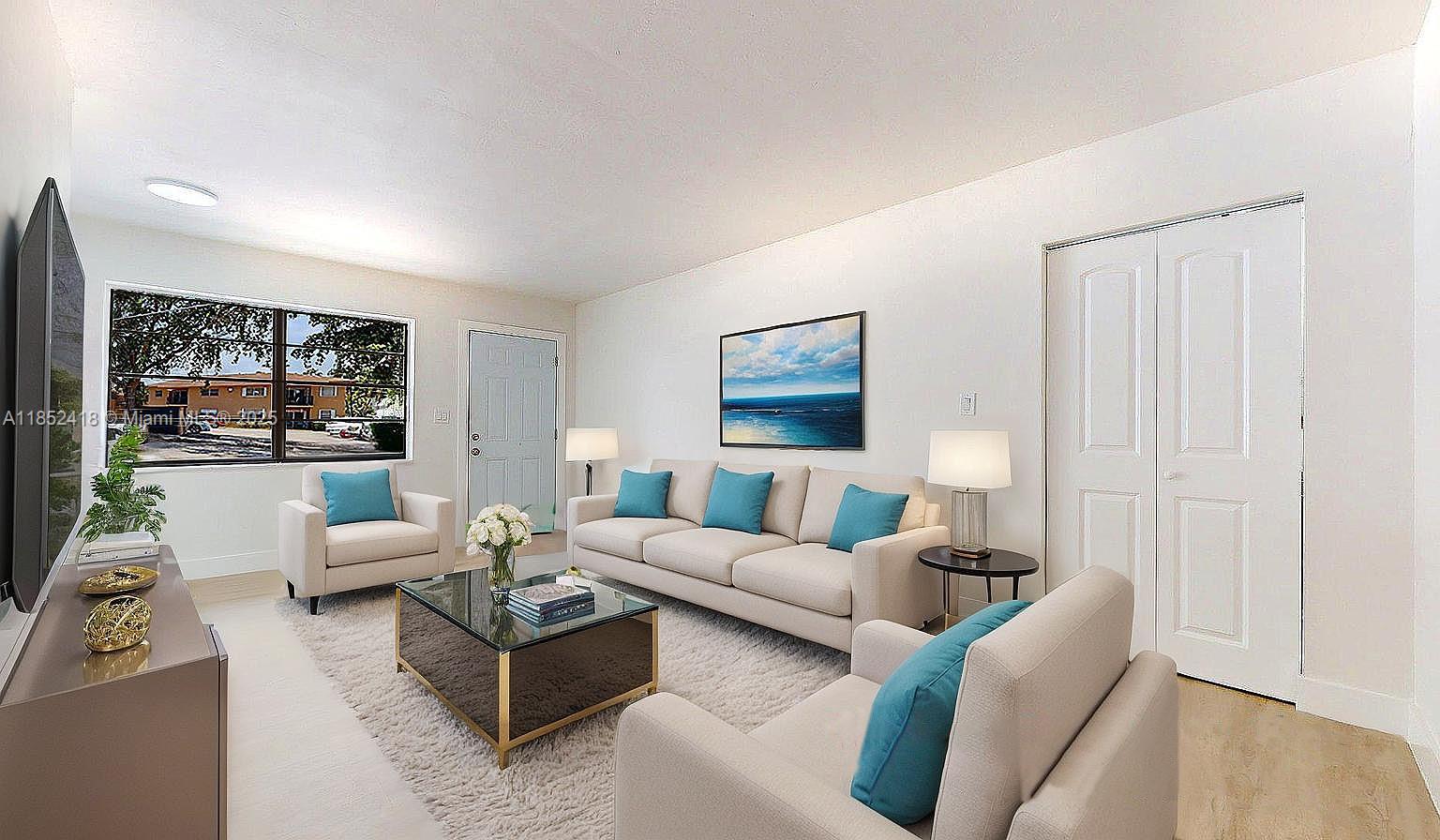 1674 West 42nd Street, Unit 1674 Hialeah, FL 33012 - Photo 8 of 29 a living room with furniture and a large window