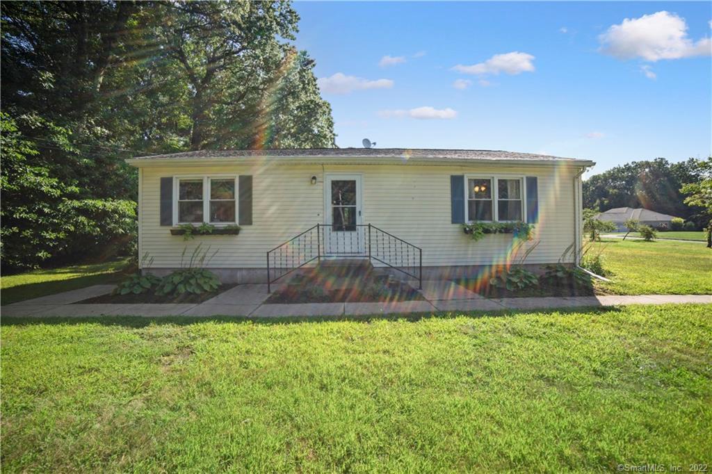 Welcome to 3 Grant Road in Ellington - This 3 bedroom Ranch is set on over an acre corner lot.