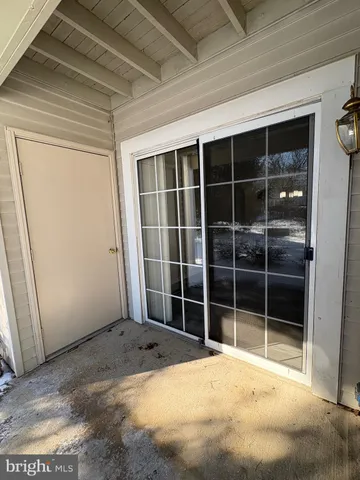 a view of empty room with windows