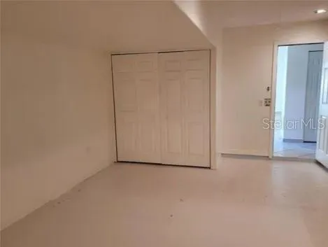 a view of a room with an empty space