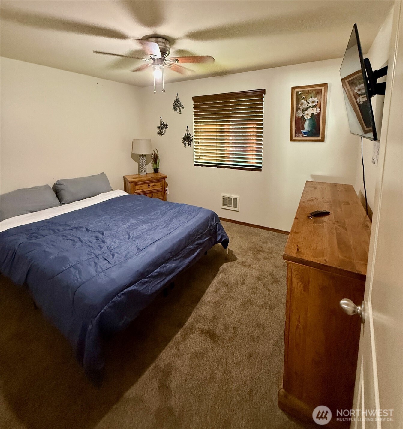 381 Elk Valley Road Forks, WA 98331 - Photo 20 of 26 a bedroom with a bed dresser and a window