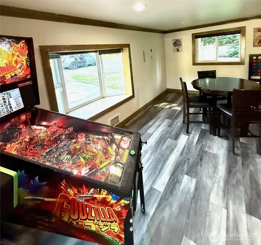 a view of a living room and dining room