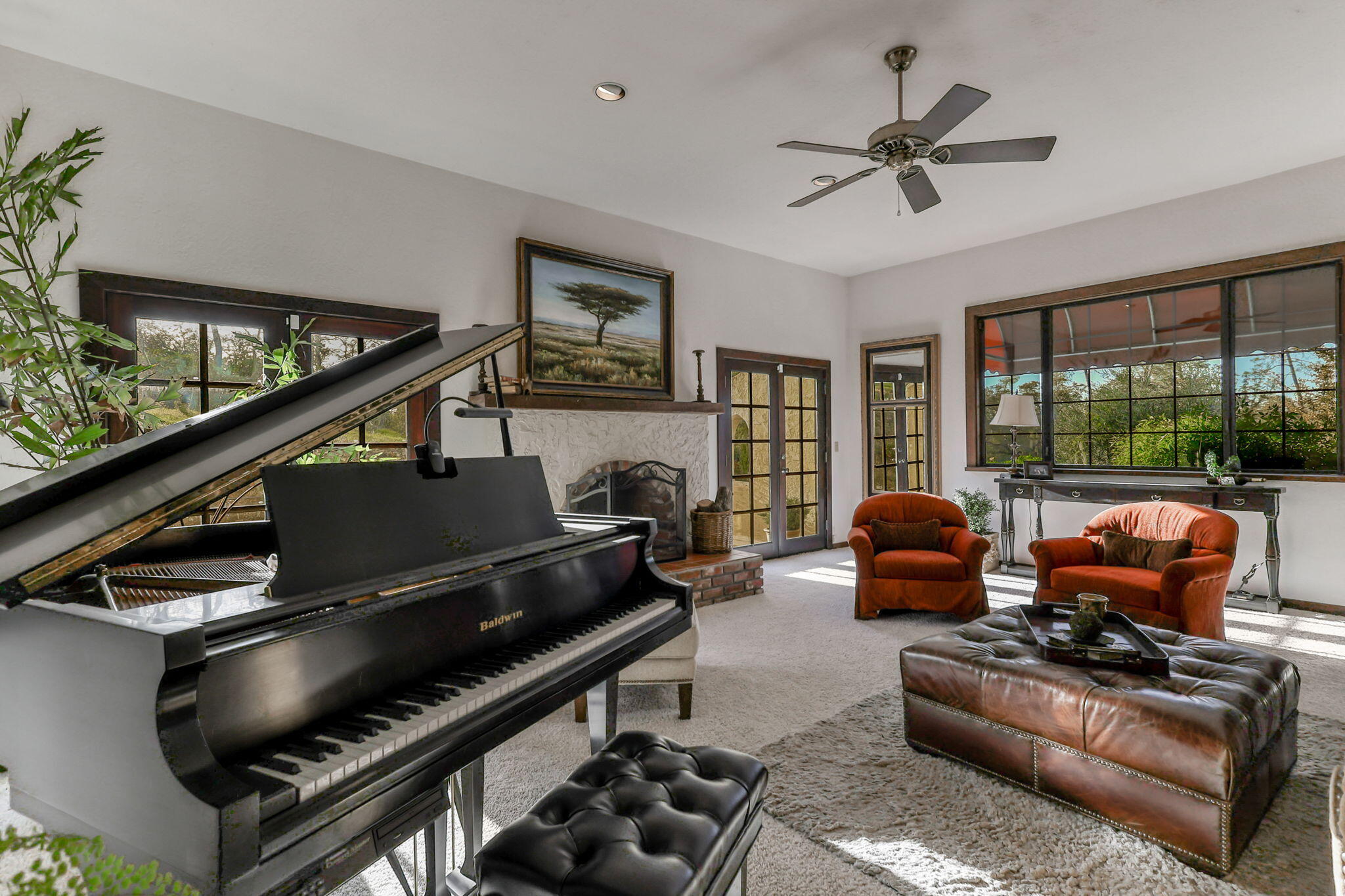 22797 Silverlode Lane Palo Cedro, CA 96073 - Photo 15 of 64 a living room with furniture and a floor to ceiling window