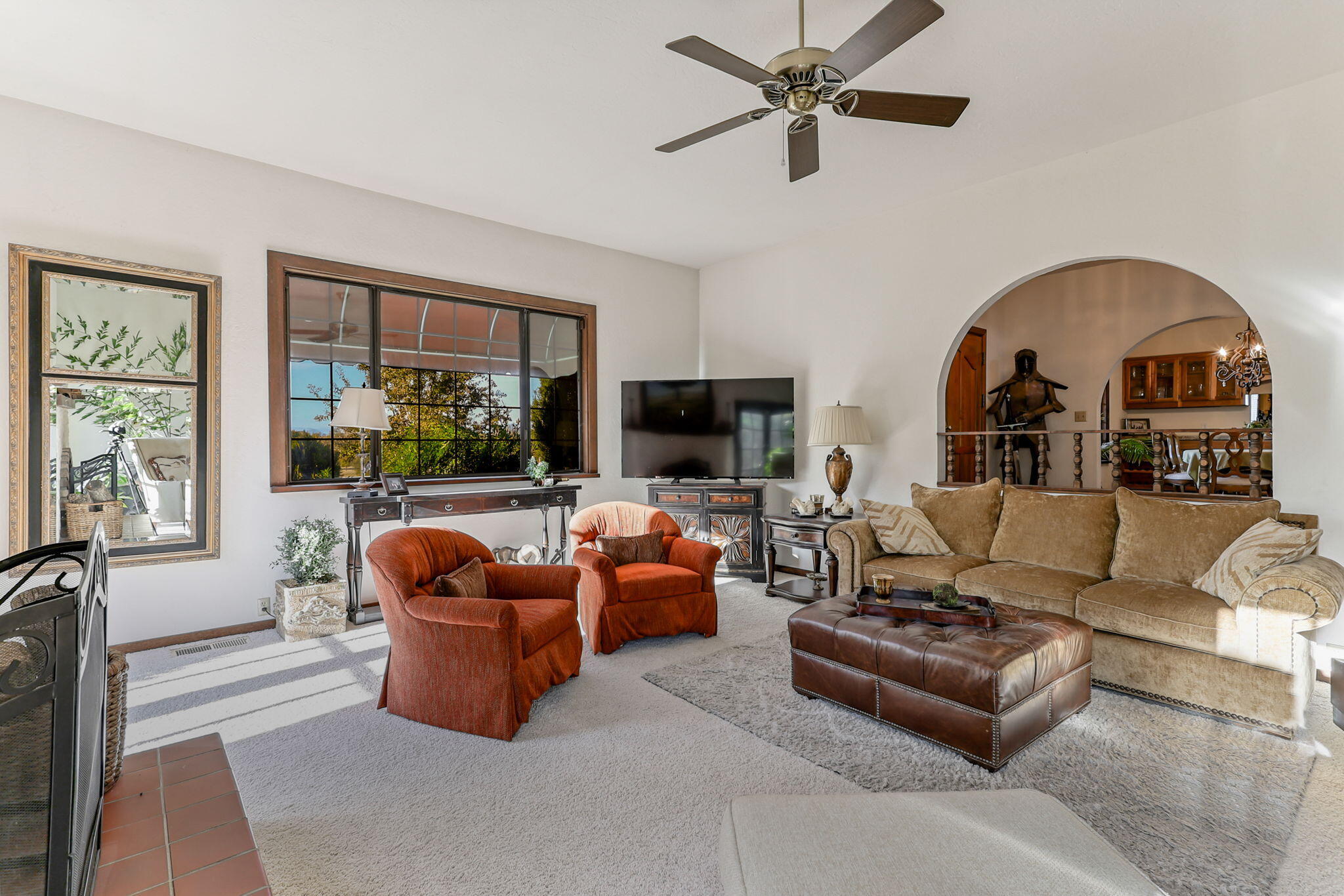 22797 Silverlode Lane Palo Cedro, CA 96073 - Photo 17 of 64 a living room with furniture ceiling fan and a window
