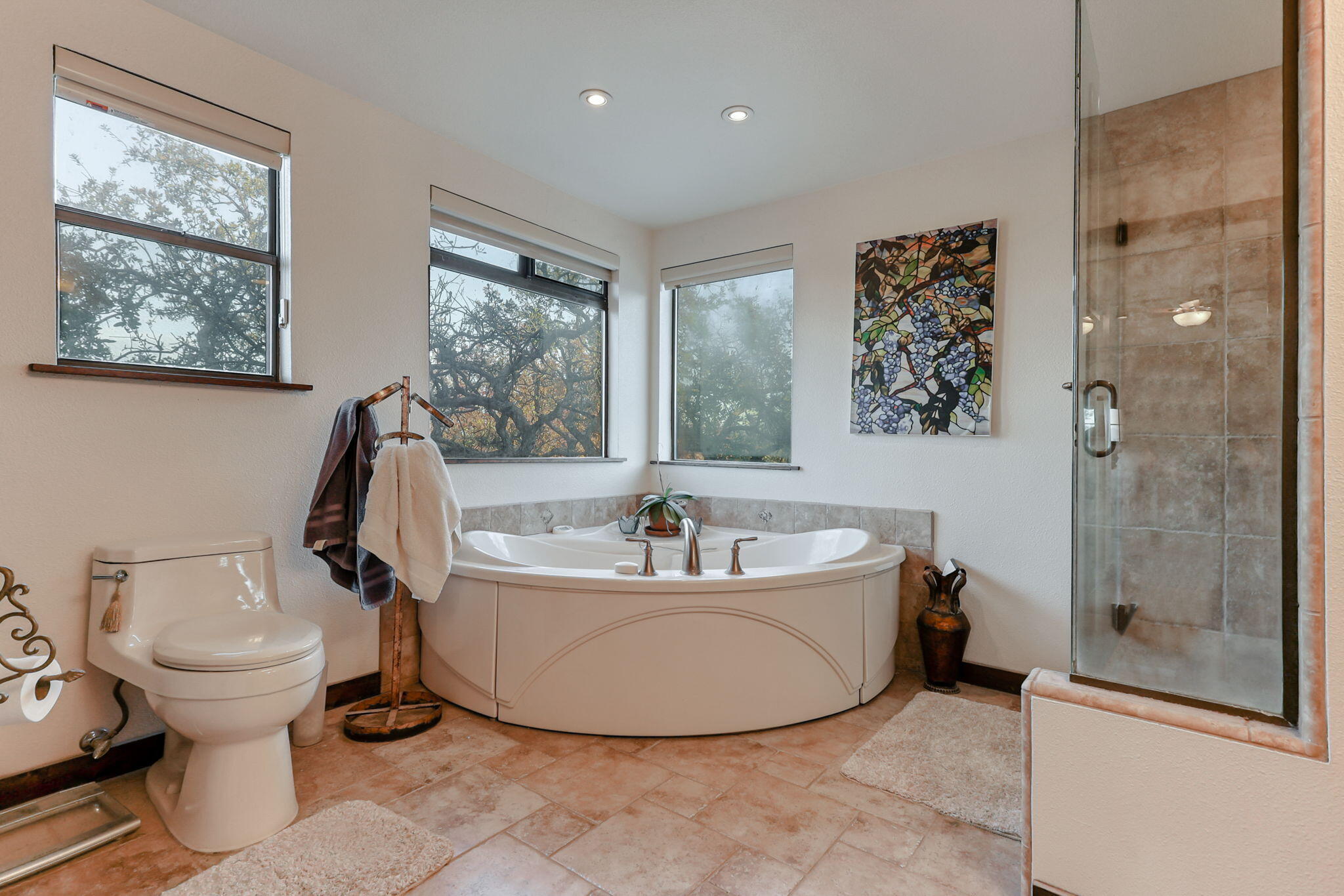 22797 Silverlode Lane Palo Cedro, CA 96073 - Photo 46 of 64 a bathroom with a tub a toilet and a shower