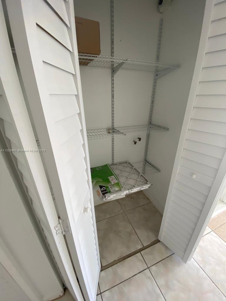850 Southwest 74th Terrace, Unit 2 Pompano Beach, FL 33068 - Photo 9 of 11 a view of a garage