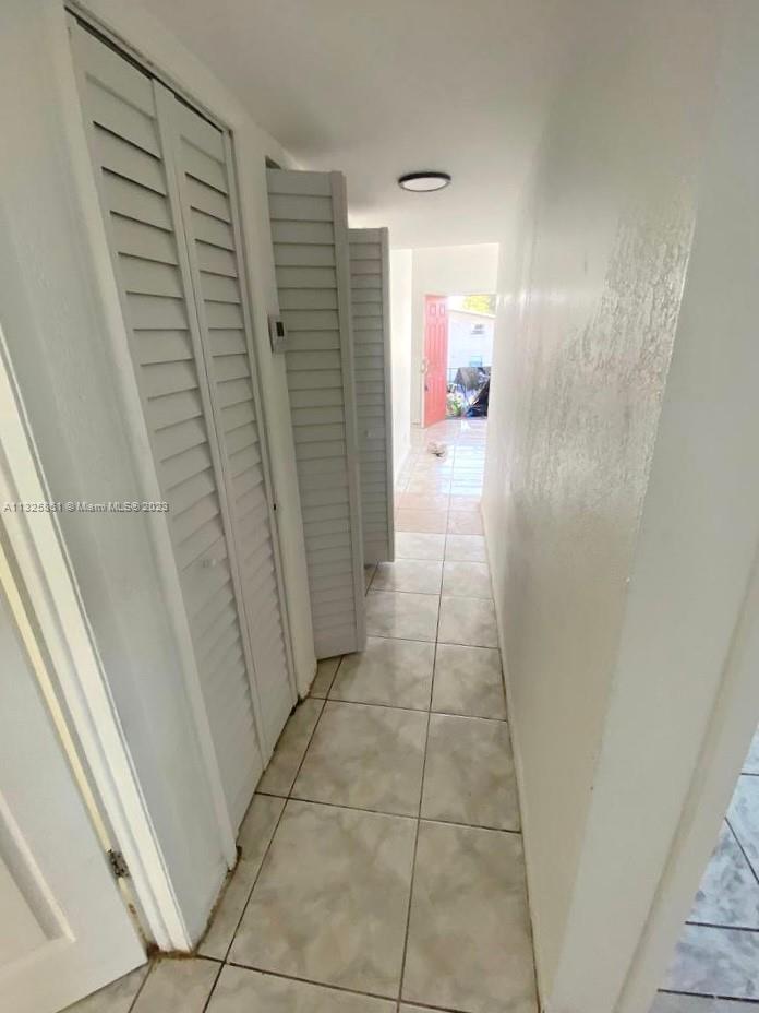 850 Southwest 74th Terrace, Unit 2 Pompano Beach, FL 33068 - Photo 10 of 11 a bathroom with a shower