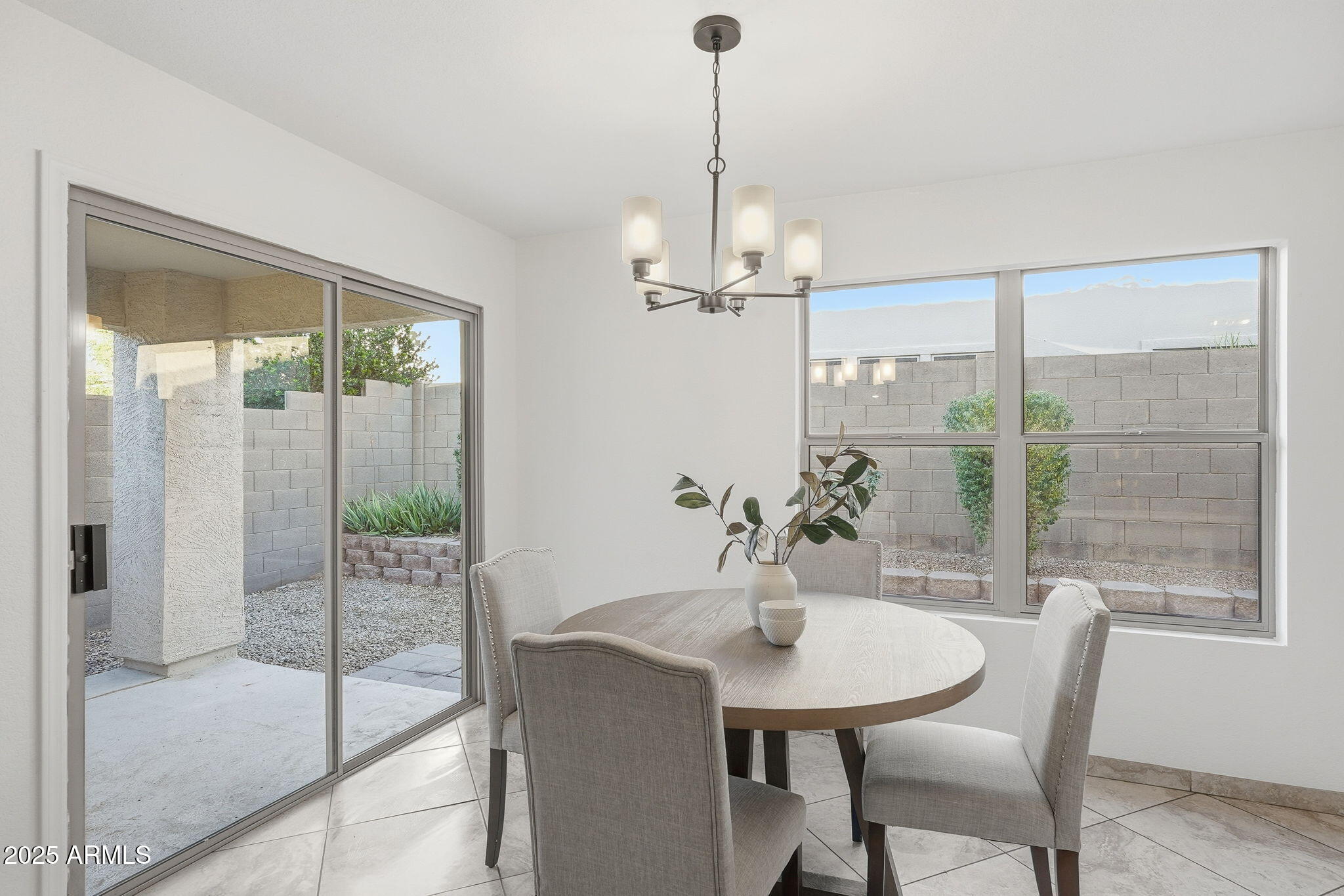 3287 South Bowman Road Apache Junction, AZ 85119 - Photo 9 of 40 a view of a dining room with furniture window and outside view