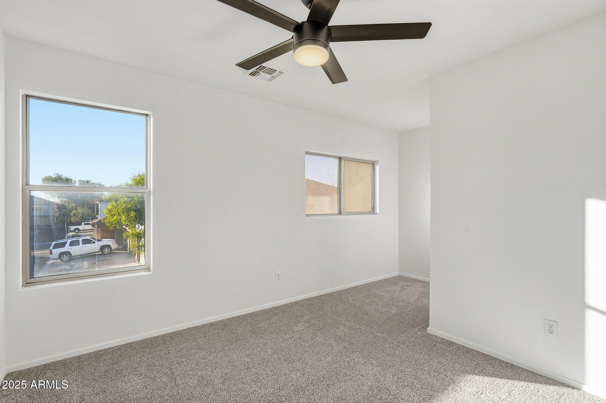 3287 South Bowman Road Apache Junction, AZ 85119 - Photo 26 of 40 a view of an empty room with a window