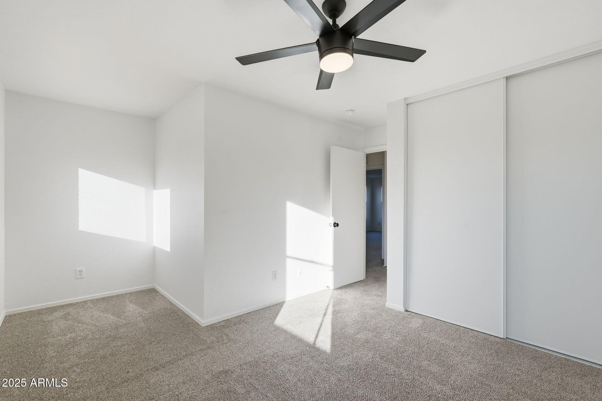 3287 South Bowman Road Apache Junction, AZ 85119 - Photo 27 of 40 a view of an empty room and window