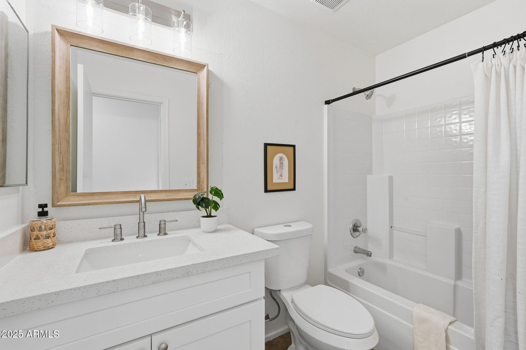 3287 South Bowman Road Apache Junction, AZ 85119 - Photo 28 of 40 a bathroom with a sink toilet and shower