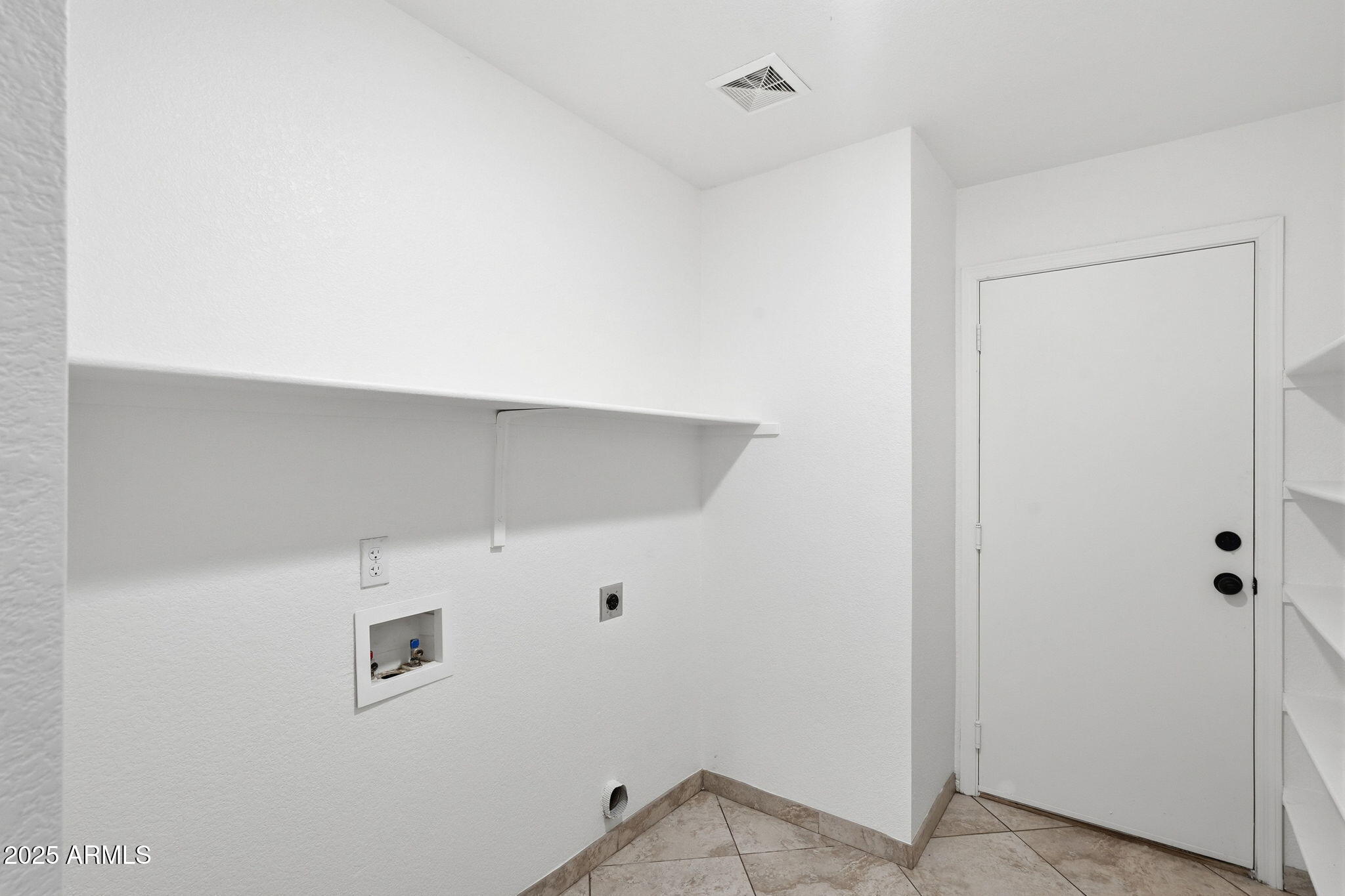 3287 South Bowman Road Apache Junction, AZ 85119 - Photo 34 of 38 a view of an empty walk in closet