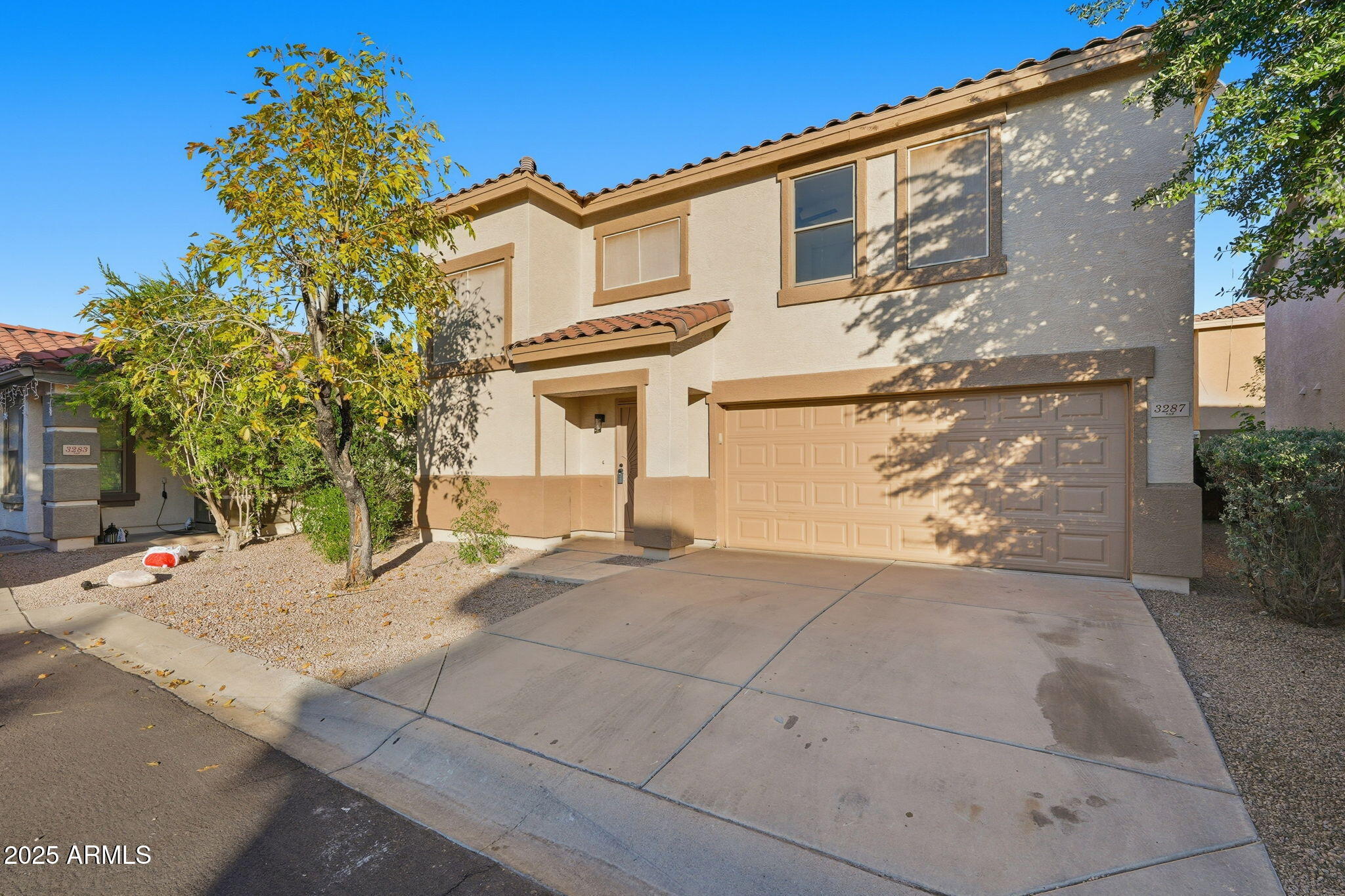 3287 South Bowman Road Apache Junction, AZ 85119 - Photo 3 of 40 a view of a front of house with a street