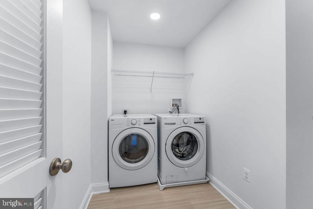 51 South Fulton Avenue Baltimore, MD 21223 - Photo 27 of 44 a utility room with dryer and washer