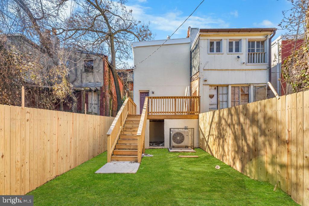 51 South Fulton Avenue Baltimore, MD 21223 - Photo 39 of 44 a view of a house with a yard