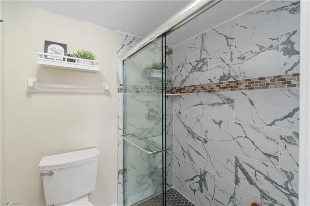 a view of a kitchen with washer and dryer