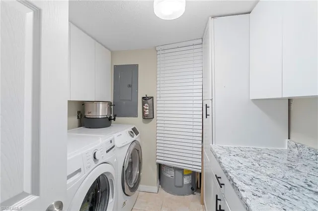 a work room with furniture and windows