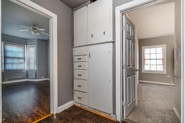 a bathroom with a sink toilet and mirror