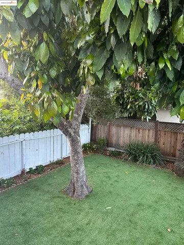 a view of a chairs and table in the balcony