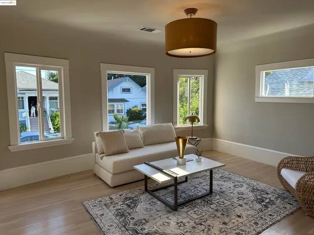 a room with furniture and a fireplace