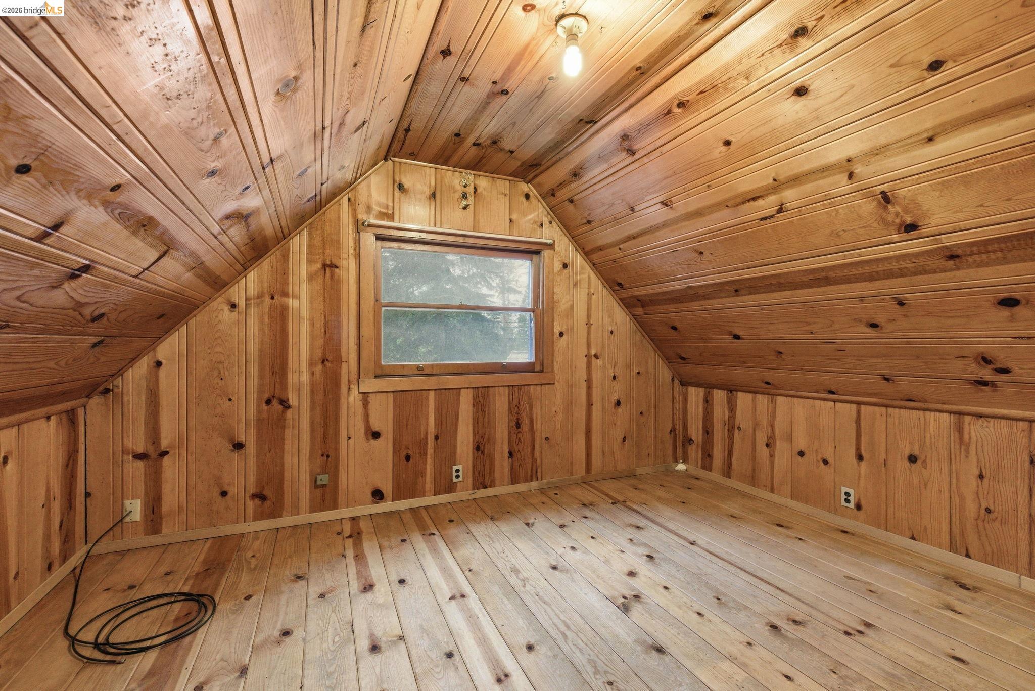 24249 Sugarpine Road Mi Wuk Village, CA 95383 - Photo 11 of 18 a view of a hallway with wooden floor