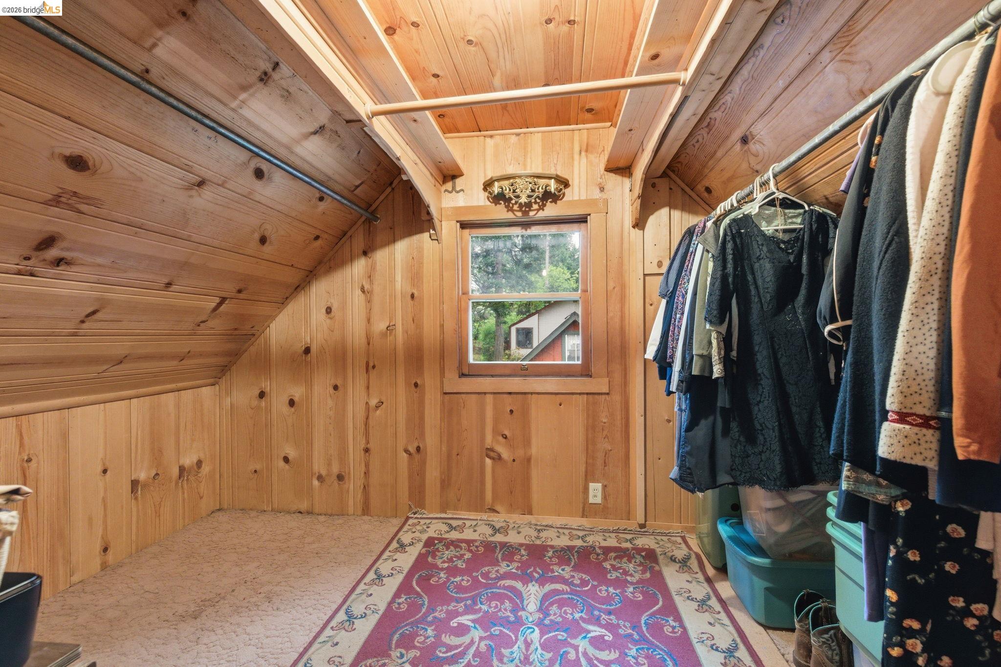 24249 Sugarpine Road Mi Wuk Village, CA 95383 - Photo 12 of 18 a view of walk in closet with clothes and shoes