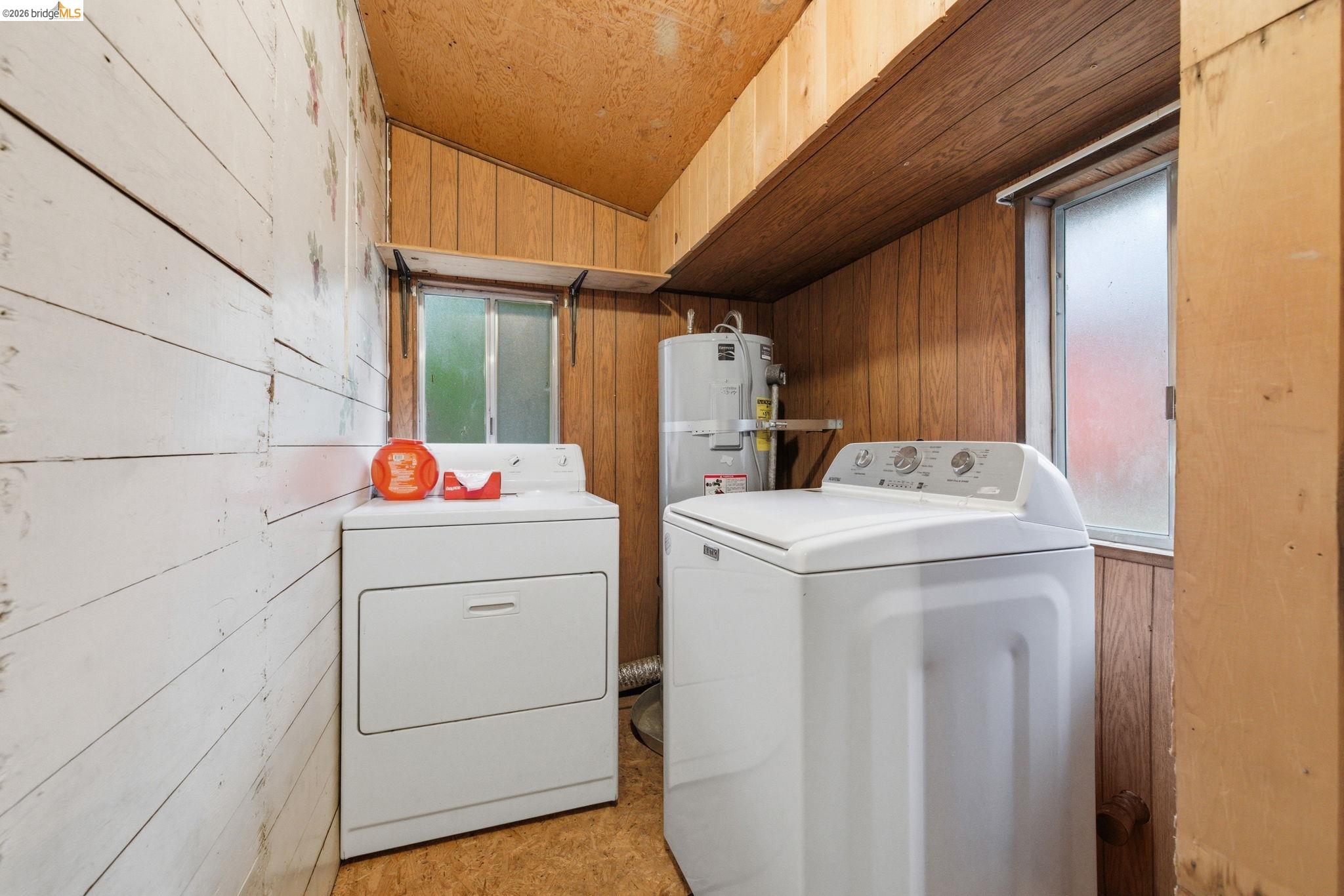 24249 Sugarpine Road Mi Wuk Village, CA 95383 - Photo 16 of 18 a utility room with dryer and washer