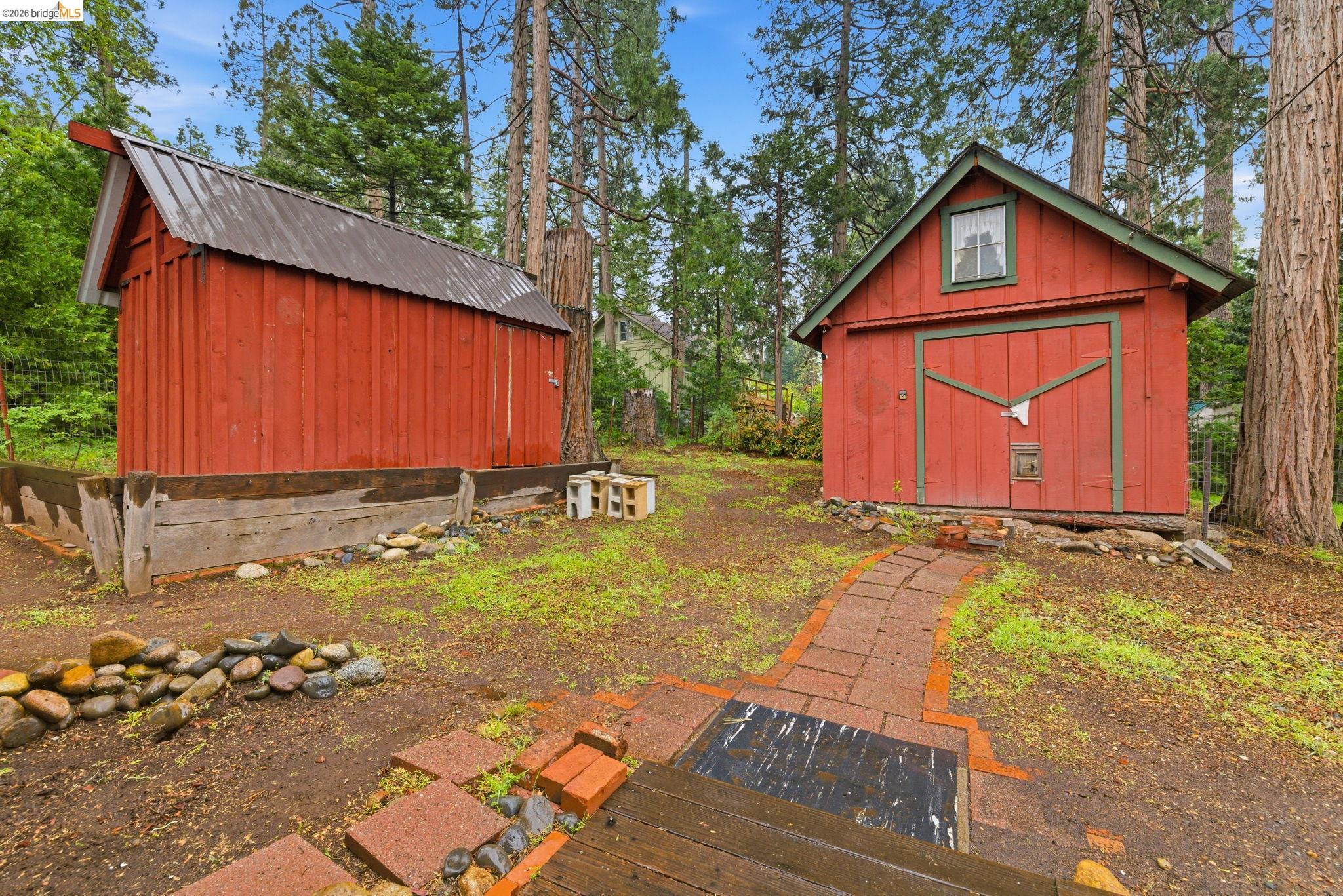 24249 Sugarpine Road Mi Wuk Village, CA 95383 - Photo 18 of 18 a view of a backyard with a garden