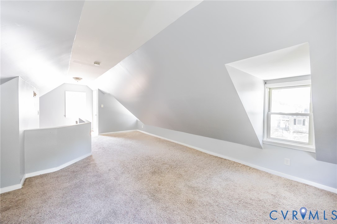 3505 Meadowbridge Road Richmond, VA 23222 - Photo 17 of 20 Carpeted flooring, sloped ceiling, transom window,