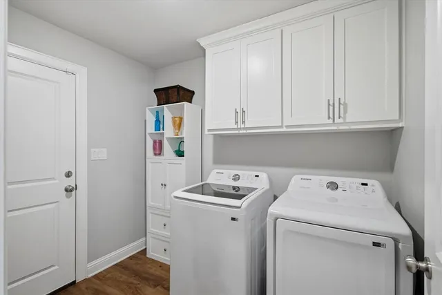a view of storage and utility room with washer and dryer
