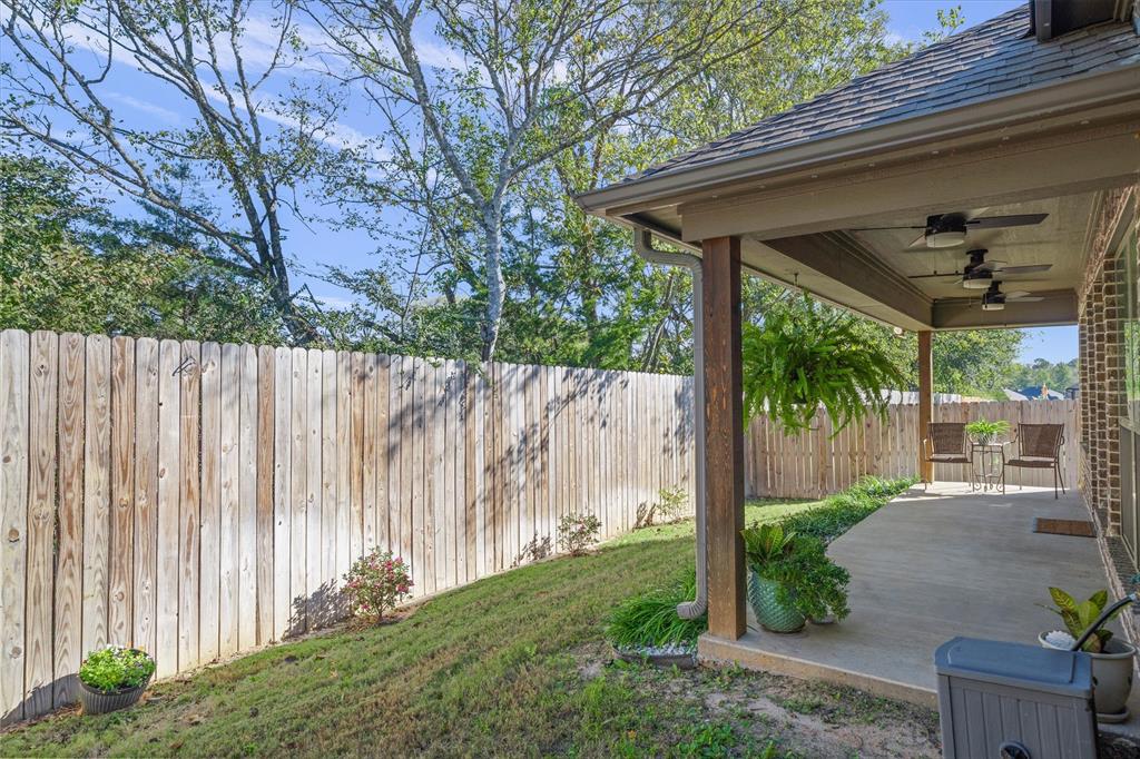 10059 Dayspring Drive Flint, TX 75762 - Photo 37 of 37 a view of a backyard with a garden