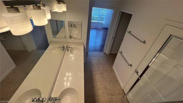 a view of a lake with houses in the back