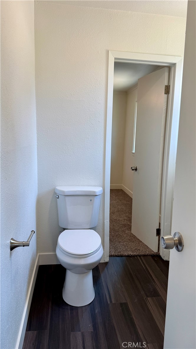 4542 Bandini Avenue Riverside, CA 92506 - Photo 21 of 22 a bathroom with a toilet
