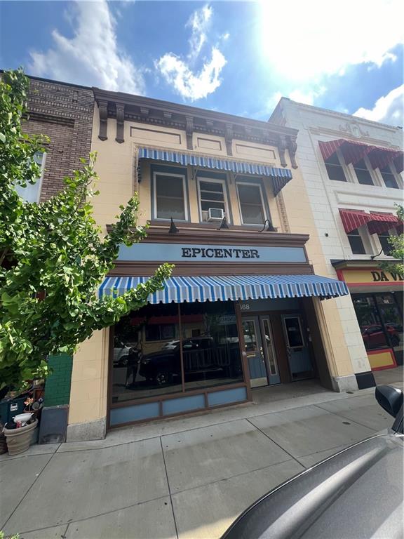 568 Merchant Street Ambridge, PA 15003 - Photo 9 of 9 a front view of a building with garage