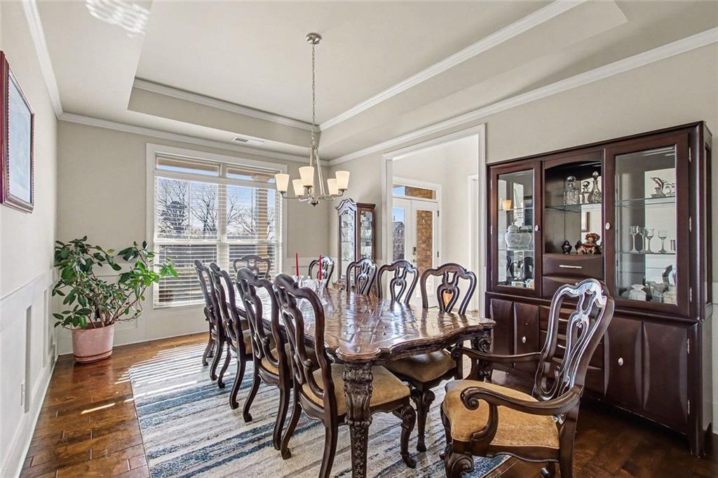 971 Traditions Way Jefferson, GA 30549 - Photo 13 of 53 a view of a dining room with furniture window and wooden floor