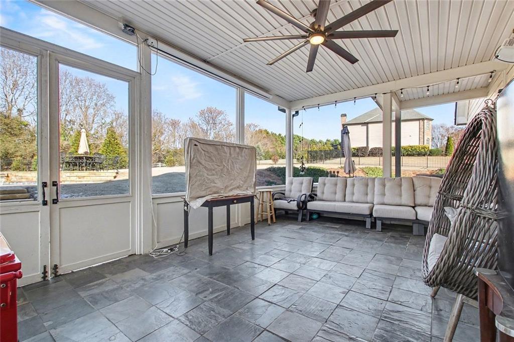 971 Traditions Way Jefferson, GA 30549 - Photo 15 of 53 a living room with a large window and furniture